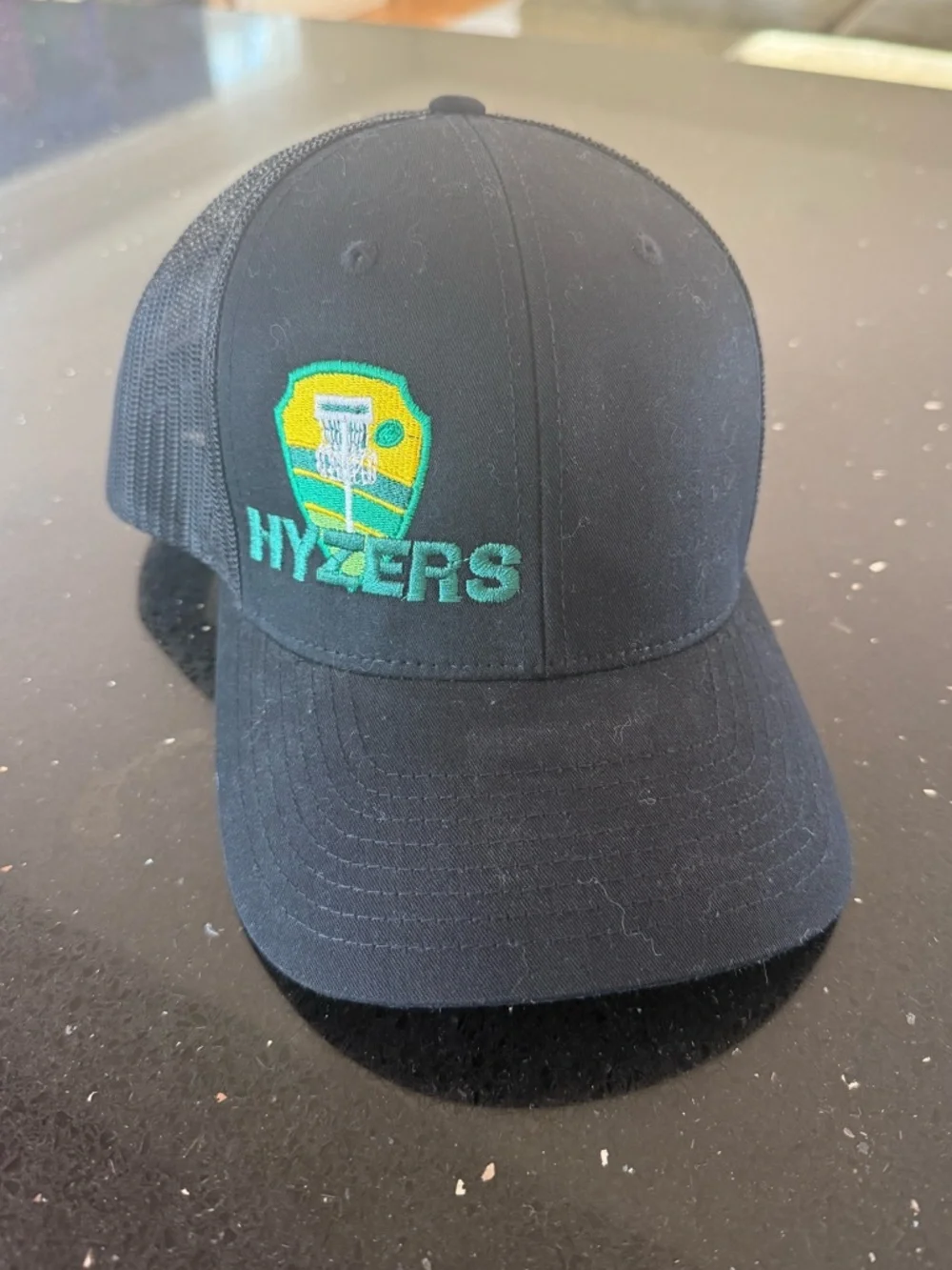 Disc Golf Black Trucker Hat with Green & Yellow HYZERS Patch